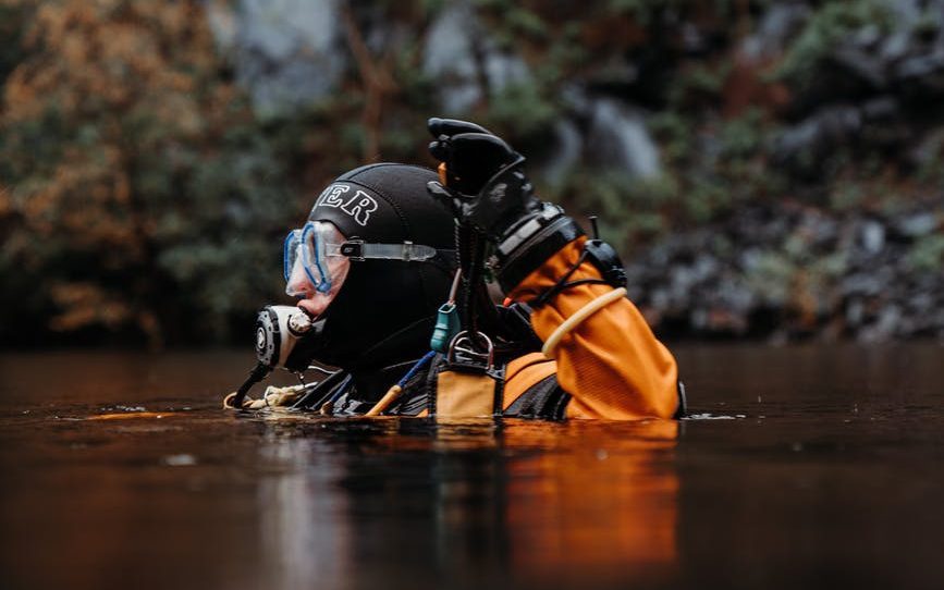 Diver in orange dry suit